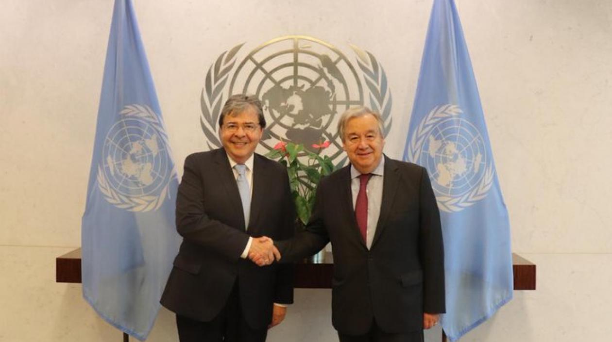 Carlos Holmes Trujillo y António Guterres.