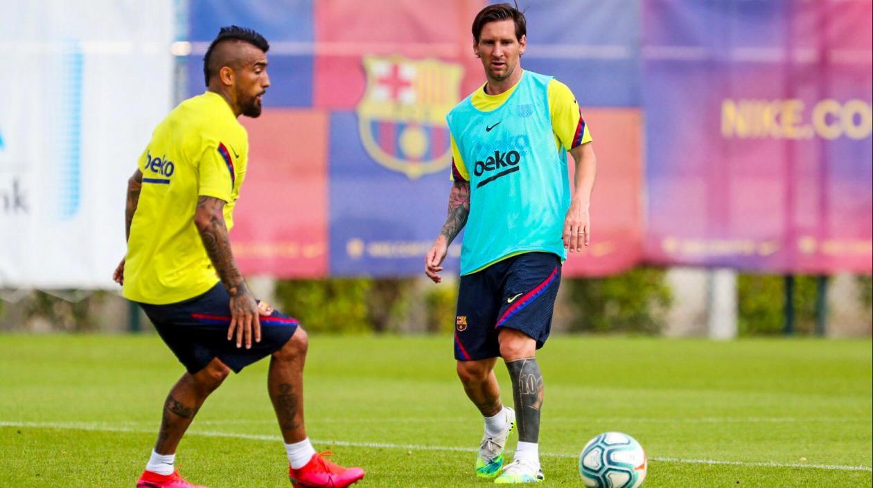Arturo Vidal y Lionel Messi.