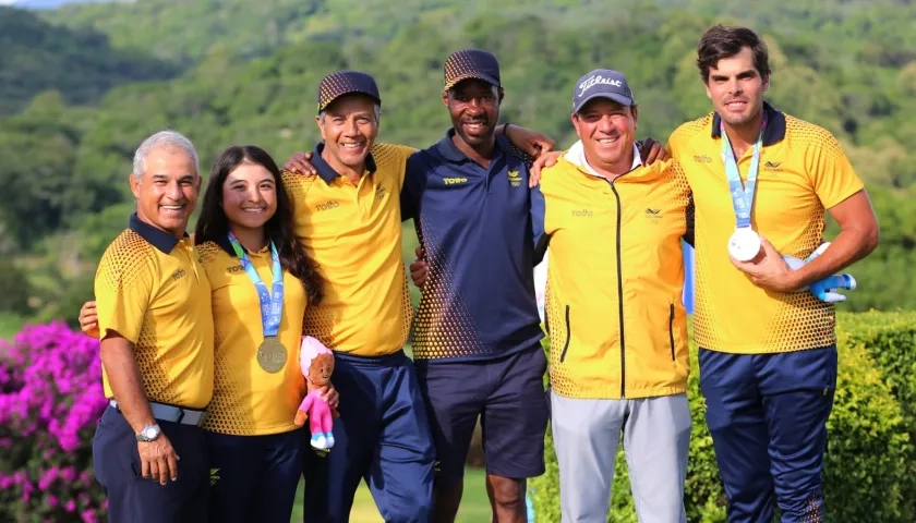 Entrenadores de los golfistas María José Marín y Ricardo Celia.