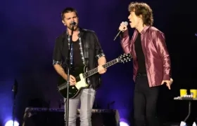 Juanes en compañía de Mick Jagger.