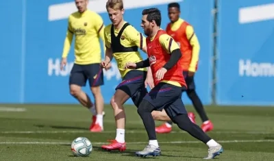 Frenkie De Jong y Lionel Messi, en un entrenamiento.